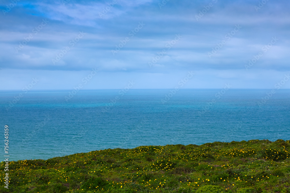 Atlantic Ocean landscape view from Cabo da Roca in Portugal. Amazing blue turquoise water color. Atlantic Ocean landscape view from Cabo da Roca in Portugal. Amazing blue turquoise water color.