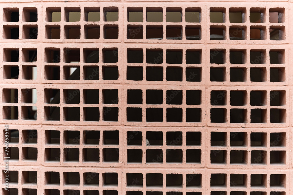 Wall ventilation hole pattern from symmetrical bricks Wall ventilation hole pattern from symmetrical bricks