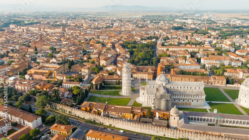 Pisa, Italy. Famous Leaning Tower and Pisa Cathedral in Piazza dei Miracoli. Summer. Morning hours, Aerial View photo