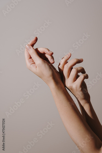 Female hands on white background. Closeup view
