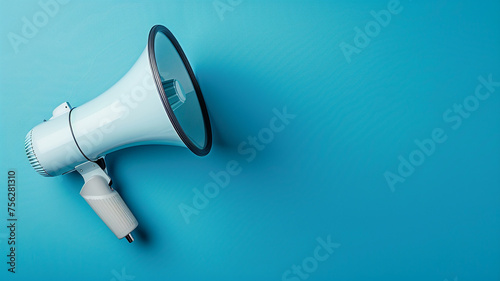 White and orange megaphone on a blue background