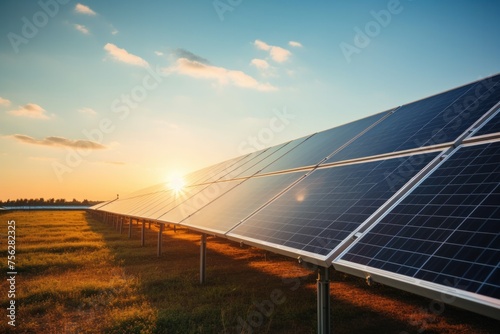 Solar panels, turbines, high voltage poles Renewable energy concept © ORG