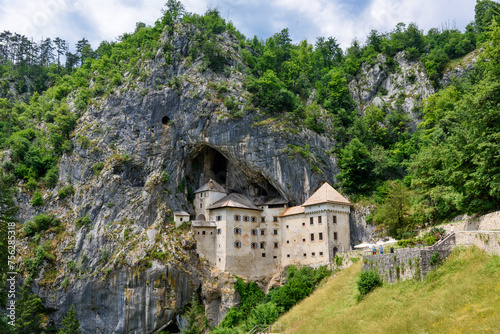 Predjama, Slovenia - June 27, 2023: Predjama Castle in Slovenia, Europe. Renaissance castle built within a cave mouth in south central Slovenia. photo