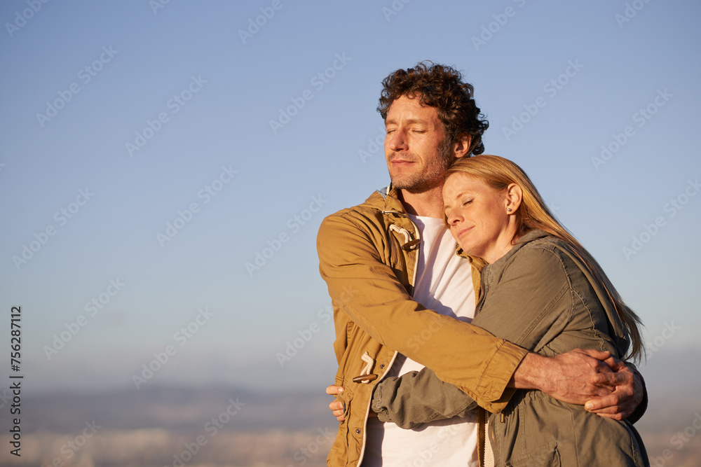 Outdoor, hug and couple with love, marriage or happiness with romance or honeymoon with joy. People, embrace or woman with man or date with anniversary or relationship with sunset or bonding together Outdoor, hug and couple with love, marriage or happiness with romance or honeymoon with joy. People, embrace or woman with man or date with anniversary or relationship with sunset or bonding together
