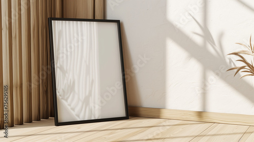 An empty black poster frame placed on a light wood floor, creates an elegant empty photo frame mockup. Ai generated Images