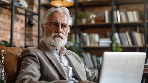 Portrait of senior man in library. 