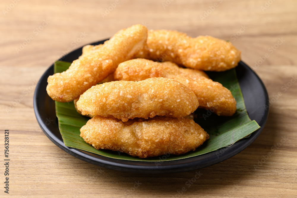 Deep fried banana with flour and sesame, Thai street food