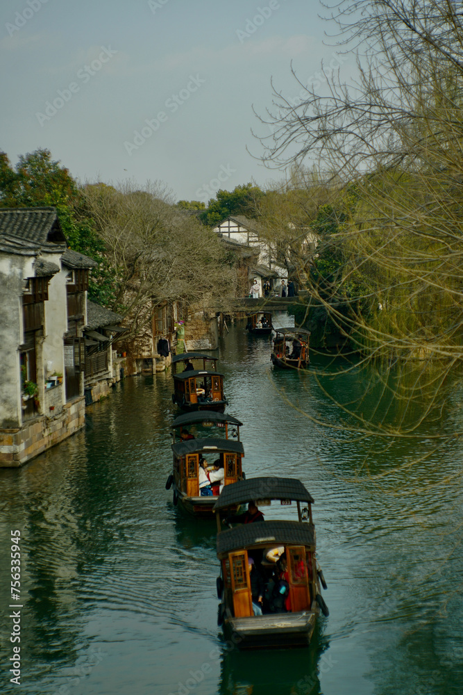 Traditional Chinese boat on a river in Wuzhen, Zhejiang, China