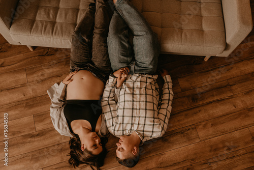 an incredibly beautiful married couple Expecting child, pregnant wife.
