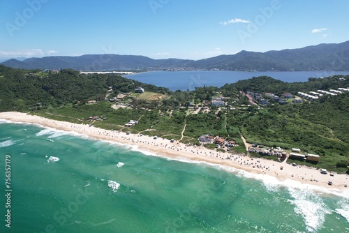 Mole beach aerial view, Florianopolis island, Santa Catarina. Conceicao Lake at background. photo