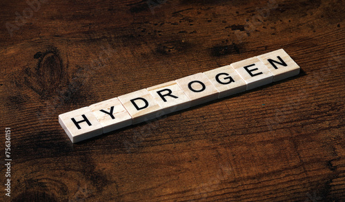 Hydrogen word text on wooden background