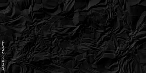 Crumpled paper texture and black crumpled paper texture crush paper so that it becomes creased and wrinkled. Old black crumpled paper sheet background texture. 