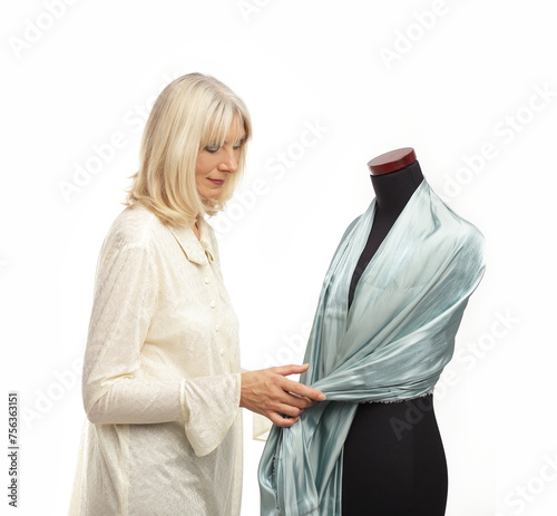 dress maker posing over white