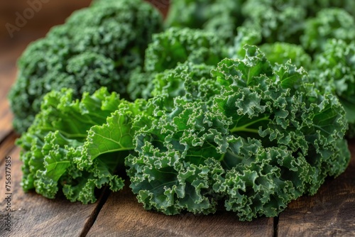 Kale leaves Green Fresh Organic on wooden background, close up. Vegetable, raw kale salad for healthy vegetarian salad.