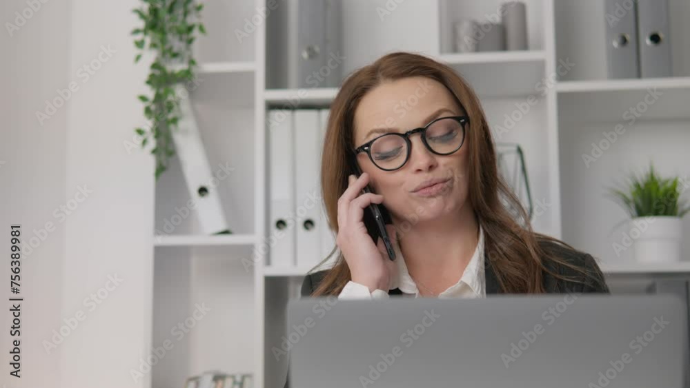 Lady in Business: Innovating and Managing Projects on the Road to Success. Talking on the phone, smiling. A businesswoman who turns challenges into opportunities and leads her team to victory. Lady in Business: Innovating and Managing Projects on the Road to Success. Talking on the phone, smiling. A businesswoman who turns challenges into opportunities and leads her team to victory.