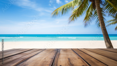 Wood table top on blur beach background used for display or montage your products, travel and relax activity concept © Tommyview