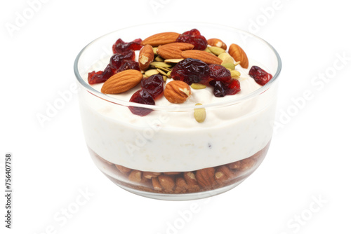 Yogurt parfait with jam, dried fruit and toasted nuts, sprinkled with cinnamon powder,Isolated on a transparent background. photo