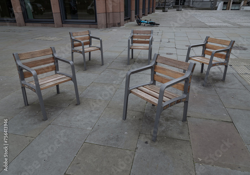 These street chairs look casually placed  but they re screwed into the floor for People can comfortably sit together. Contemporary chairs  Furniture group  Space for text  