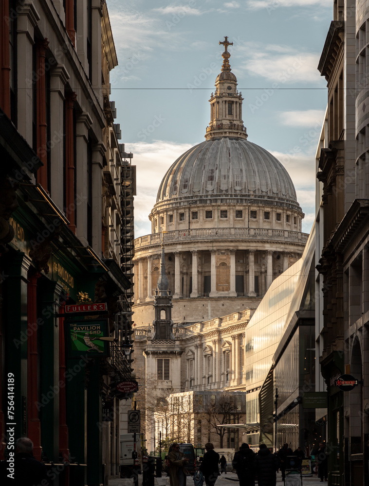 Perspective view of St. Paul's Cathedral and narrow alley with old buildings in City of London. Peter's Hill walkway, Space for text, Selective focus.