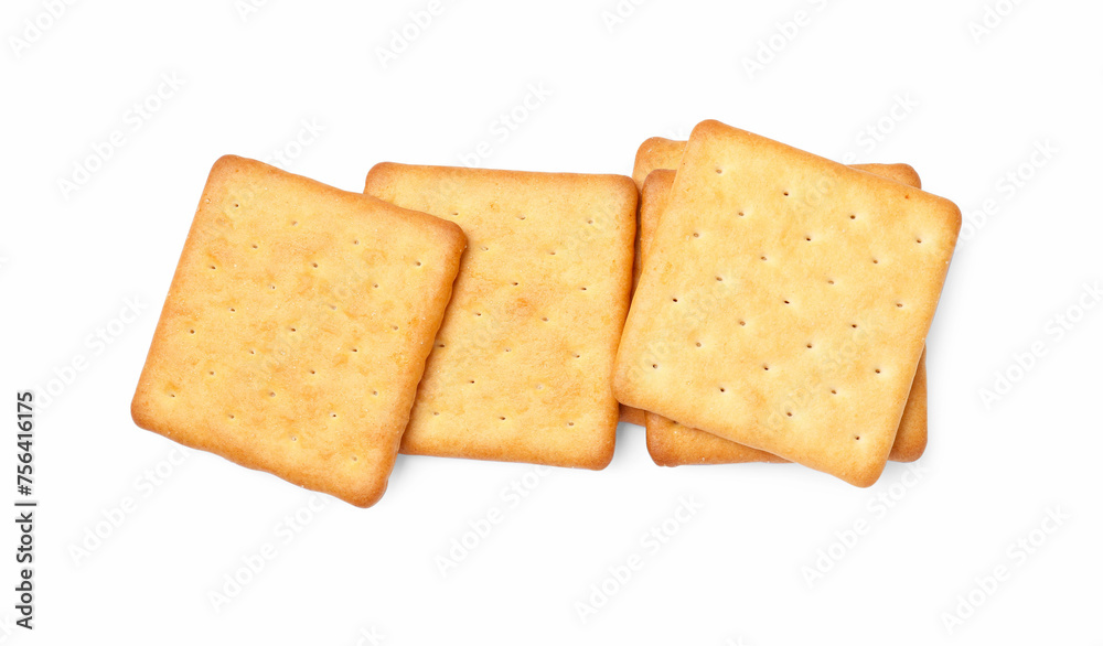 Many crispy crackers isolated on white, top view. Delicious snack Many crispy crackers isolated on white, top view. Delicious snack