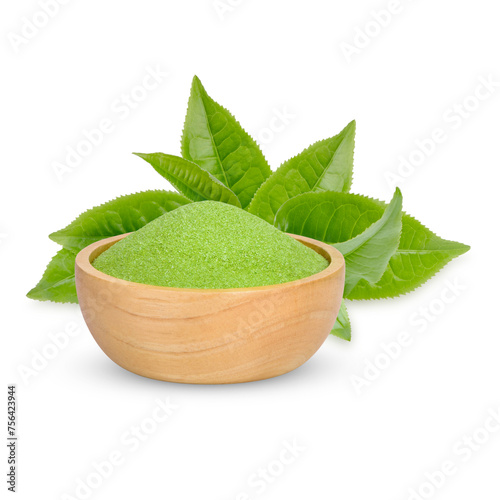 Green tea powder in a wooden cup  with leaves isolated on white background