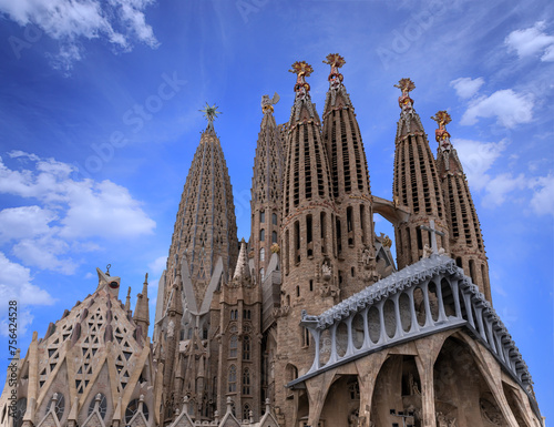 Passion Façade of the Sagrada Família with a cloudy sky in Barcelona, Spain. 