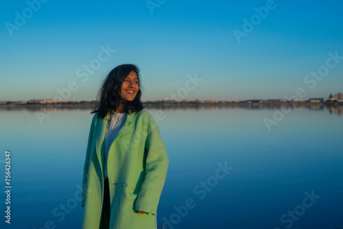 young woman happy in the lake