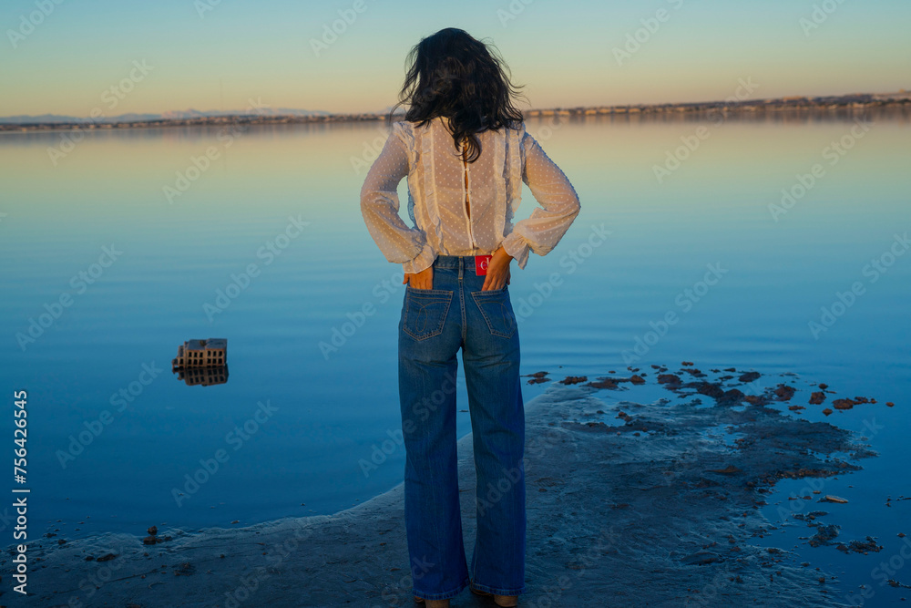 young woman happy in the lake