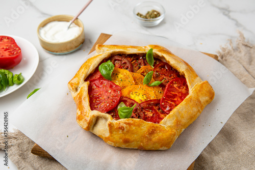 Close up of summer tomatoes tart rustic food photo