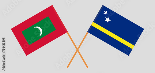 Crossed flags of Maldives and Country of Curacao. Official colors. Correct proportion