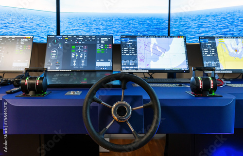 Modern ship control panel with steering wheel and engine accelerators