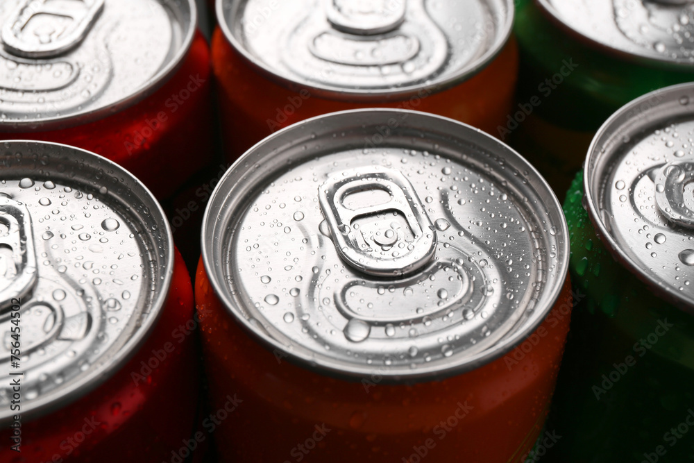 Energy drink in wet cans, closeup. Functional beverage Energy drink in wet cans, closeup. Functional beverage
