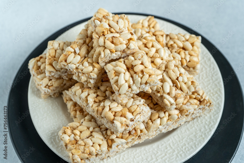 Sweet puffed rice. Food dessert crispy cracker with sugar. Sweet puffed rice. Food dessert crispy cracker with sugar.