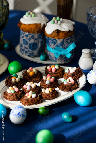 Holiday Easter homemade cookies in shape of nests with colorful sugar eggs