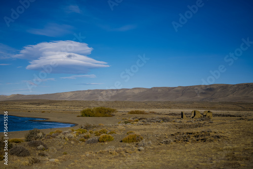 Historic ruins on a rural field under a blue sky in Patagonia  Argentina