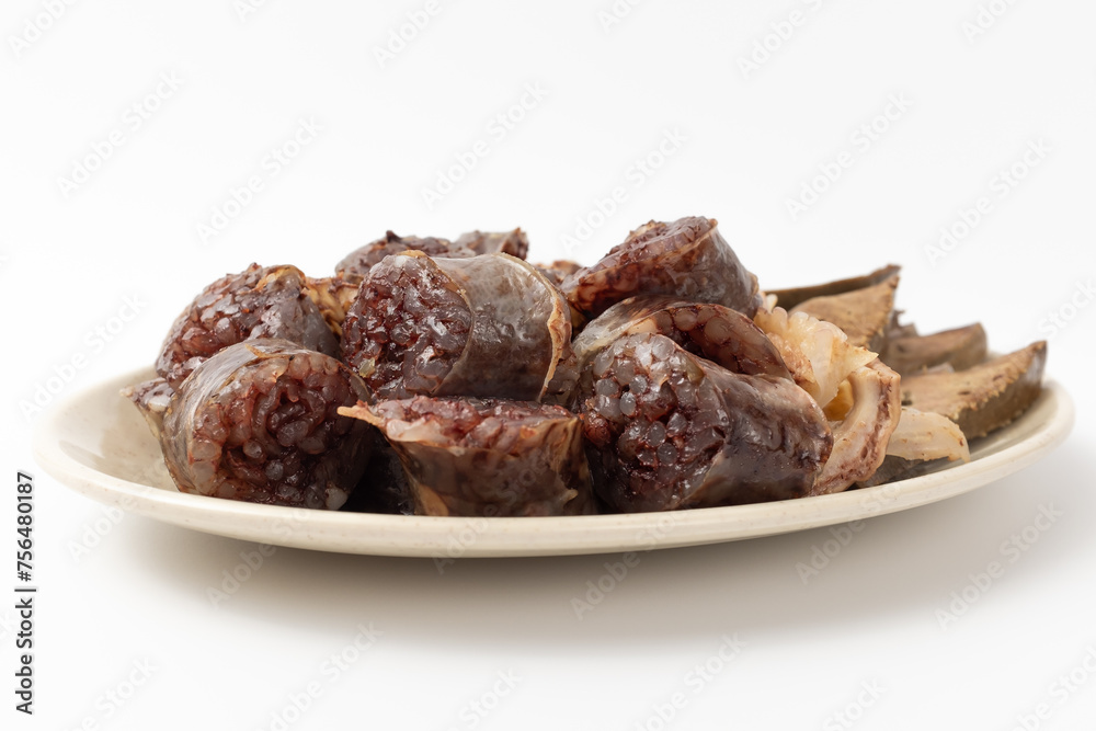 Sundae and pork intestines on white background