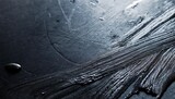 black surface with dust and oily fingerprints full frame close up background