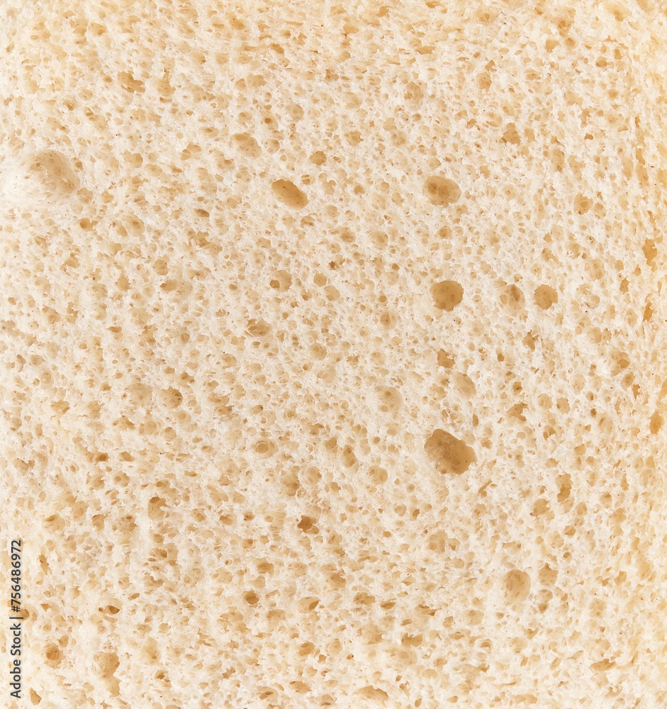 Close-up texture of a slice of whole grain bread for background.