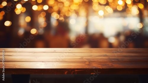 An empty wooden countertop against the blurred background of the restaurant and bokeh lights. A horizontal banner for Advertising products, Beer, Drinks, food, Cafes.