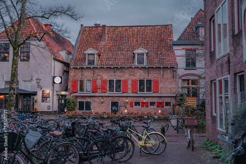 Amersfoort Netherlands, March 26 2023: Fairy tale urban landscape of the historic city of Amersfoort in rainy weather in the spring season photo