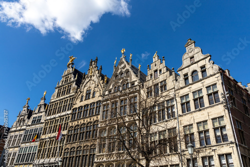 Antwerp, Belgium. 15 April 2023. Facades of Antwerp, old historical buildings in the centre of the city. Decorated with golden statues at Grote Markt of Antwerp