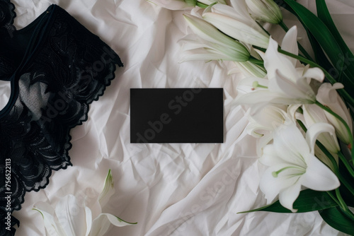 Business card mockup lingerie mockup floral, lingerie branding textile background elegant design, black bra on white background.