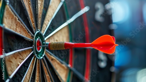 red dart hitting the center of bulls eye. Business target or goal success and winner concept