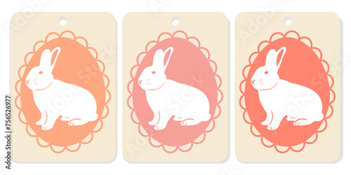 Easter bunny -vintage greeting cards, tags, labels. Set of three white bunny silhouettes for Easter greeting card, banner or poster design. Rabbit icon. Easter bunny -vintage greeting card