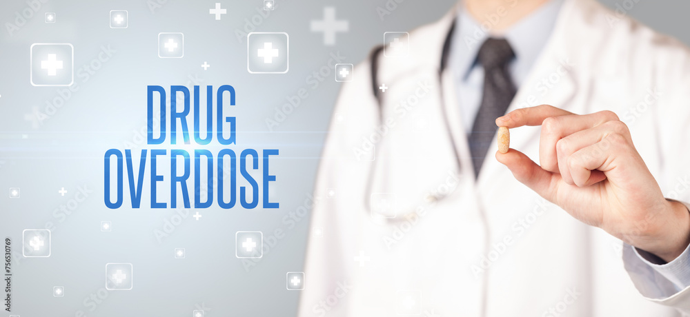 Close-up of a doctor giving a pill Close-up of a doctor giving a pill