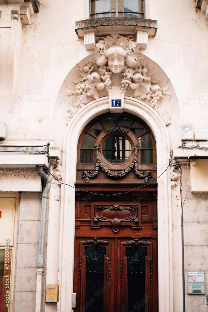 Fototapeta premium antique wooden doors and stucco above them