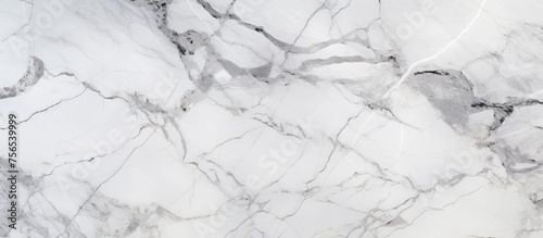 A close up of a white marble texture resembling snowcovered landscape with freezing branches and frost patterns, creating a beautiful winter scene