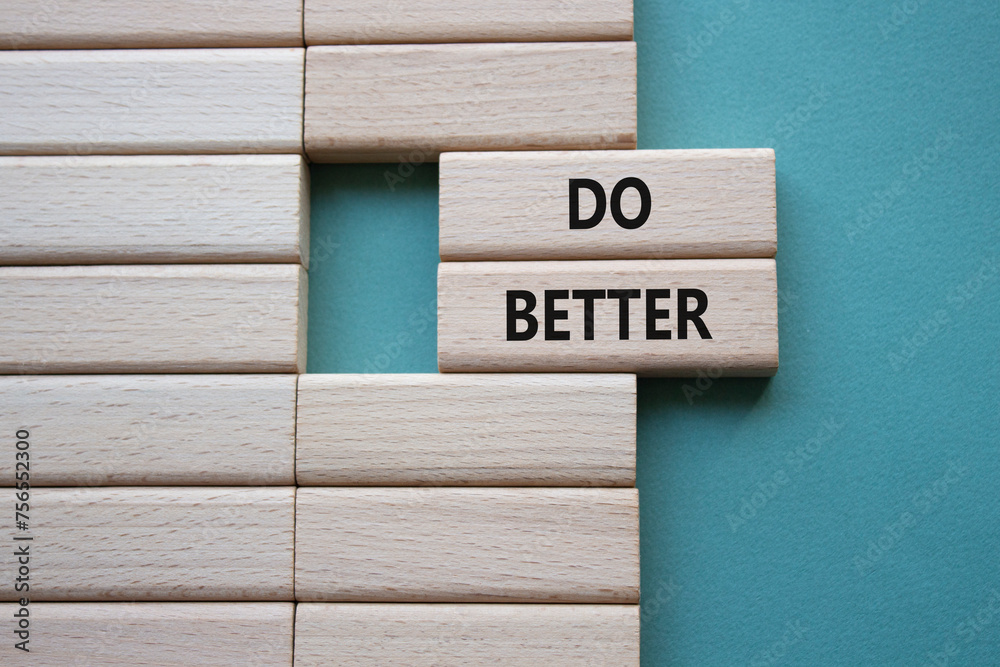 Do better symbol. Wooden blocks with words Do better. Beautiful grey green background. Business and Do better concept. Copy space. Do better symbol. Wooden blocks with words Do better. Beautiful grey green background. Business and Do better concept. Copy space.
