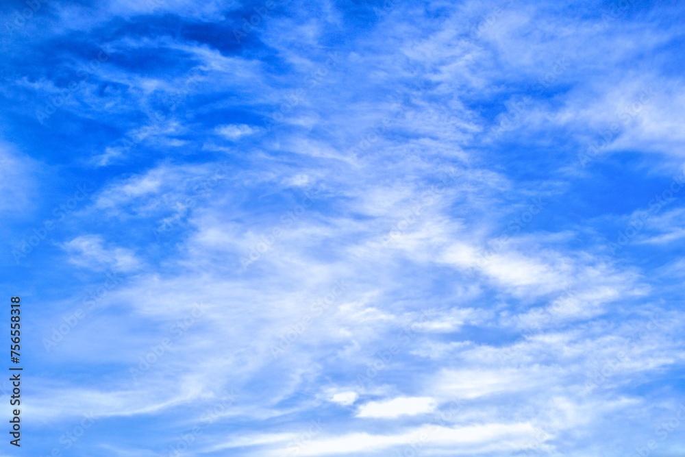 blue sky background with tiny white clouds blue sky background with tiny white clouds