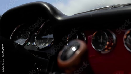 3 close-ups of a classic car, Alfa Romeo, driving through Positano, Italy